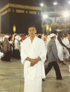 Ozil in front of the sacred Black Stone